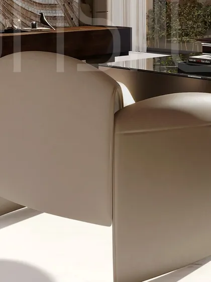A detail of the sculptural armchair, showcasing its unique form. I believe furniture should be functional art, and this piece is a perfect example of that principle.