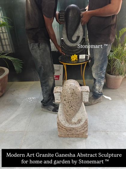 Our team carefully places the 35kg abstract granite Ganesha. This image shows both the light and dark granite color options available for this popular modern Ganesha statue design.