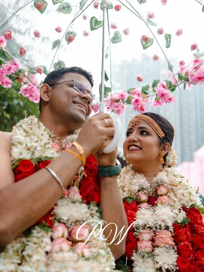 Another sweet moment from the Kashi Yatra ritual, with the bride holding a decorated umbrella. We love capturing these fun and meaningful traditions.