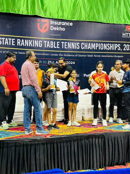 Another angle from the awards ceremony, showing the players receiving their trophies. We ensure our students are prepared not just to play well but to handle the pressure of competitive events.