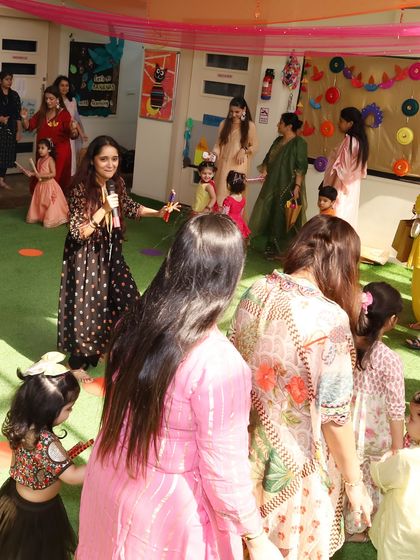 Leading the group in a fun dance routine. At our parties, it's not about perfect steps but about sharing laughs and creating wonderful memories together.