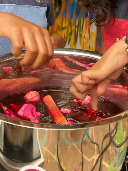 A close-up of a dye bath made with natural ingredients. The process of extracting color from plants and herbs is a magical experience that connects us to nature.