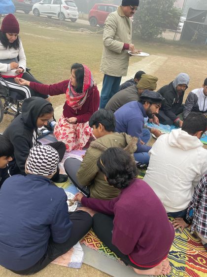 Another view of our community gathering for the New Year's Hawan. We believe in starting each year together with positive energy and shared goals for success.