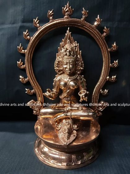 A bronze sculpture of Kalika, framed by a Prabhavali of flames. This piece, created for a client in Delhi, captures the intense energy of the goddess.