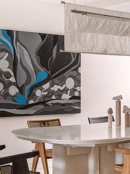 The finished canvas installed in the 'Kanso House,' where it serves as the main artwork in a minimalist dining area.