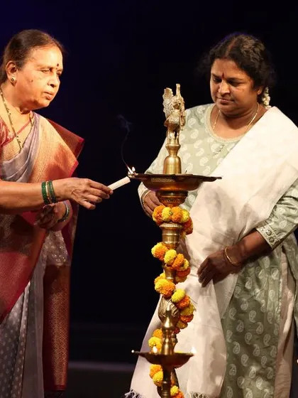 The auspicious lamp lighting ceremony at our Sadhana festival, a tradition that marks the beginning of our celebration of art and culture.