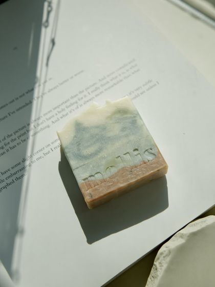 This bar features a tiny dolphin embed, a little surprise to make your shower special.