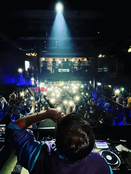 Another angle of me hyping up the audience, creating a personal connection with everyone in the room.