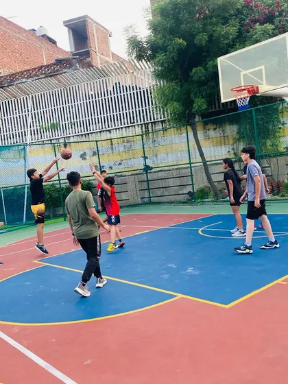 A player takes a jump shot.