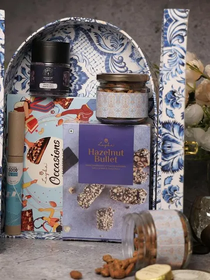 A beautiful blue and white patterned box. Sourcing unique and high-quality packaging is one of the most important parts of building a luxury gifting brand.
