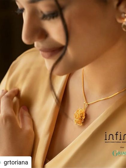 For this GRT Oriana look, we used a warm, golden satin dress to complement the intricate gold pendant. This creates a rich, monochromatic look that feels luxurious and sophisticated.