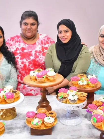 Sharing my passion for baking is one of my greatest joys. Here's a happy group of students from my basic masterclass, proudly showing off the beautiful and delicious cupcakes they learned to create.