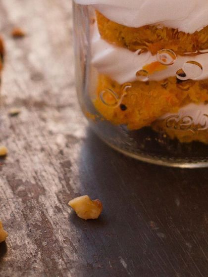 A close-up of our Carrot Walnut Jar in the making. You can see the layers of real cake and cream, proving that even our desserts in a jar are crafted with care and quality.