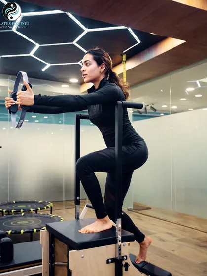 The Stability Chair is a fantastic tool for challenging balance and control. This client is performing a step-up, an exercise that strengthens the legs and glutes while engaging the core.