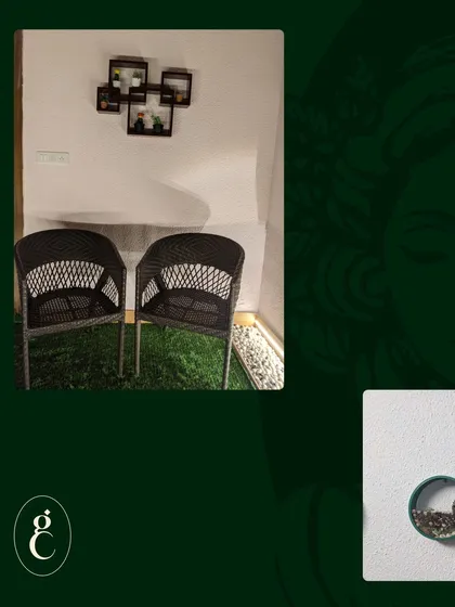 This image shows how I pair functional seating with decorative wall art and planters to create a complete and cohesive look, even in a small corner.
