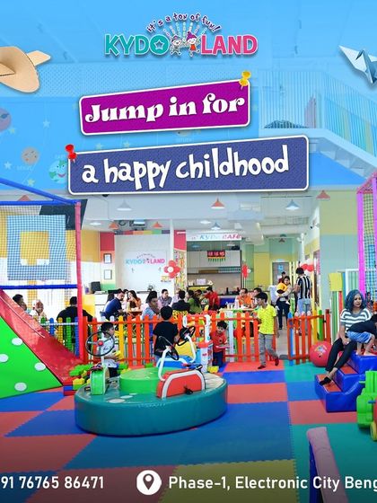 Jump in for a happy childhood. This image gives a fantastic overview of our vibrant and busy play space, inviting families to come and join the fun.