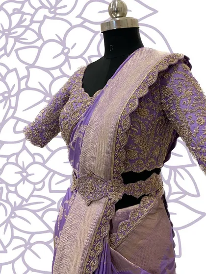 A graphic-enhanced image of the lavender bridal blouse and saree, highlighting the intricate details of the embroidery.