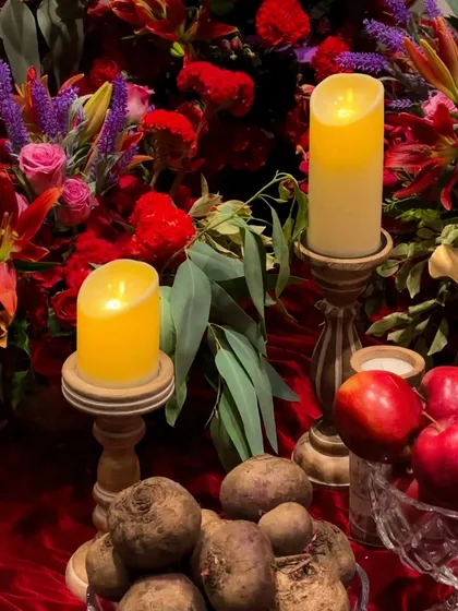 A close-up of the details from Siddartha Tytler's banquet set. I incorporated real vegetables like beetroots alongside flowers and candles to add an unexpected, earthy texture to the opulent design.
