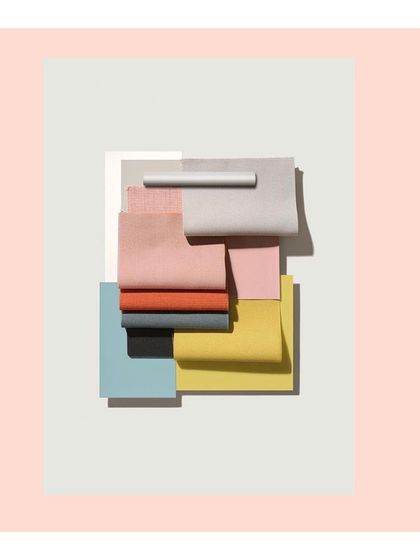 A vibrant and playful collection of fabric swatches in pastel and bright hues. This mood board represents the initial spark of inspiration for a new, colorful collection.