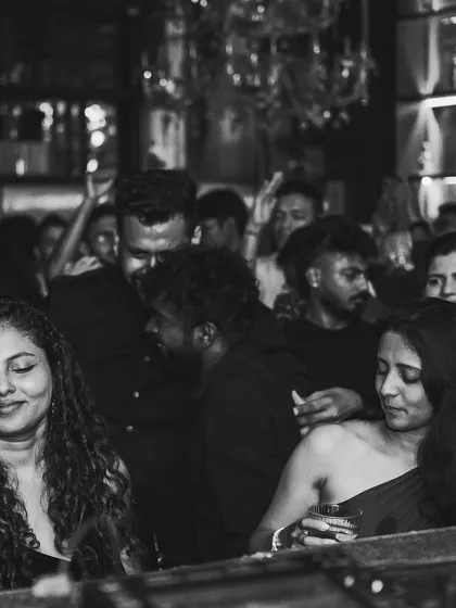 A duplicate of 50, capturing the crowd's vibe in black and white.