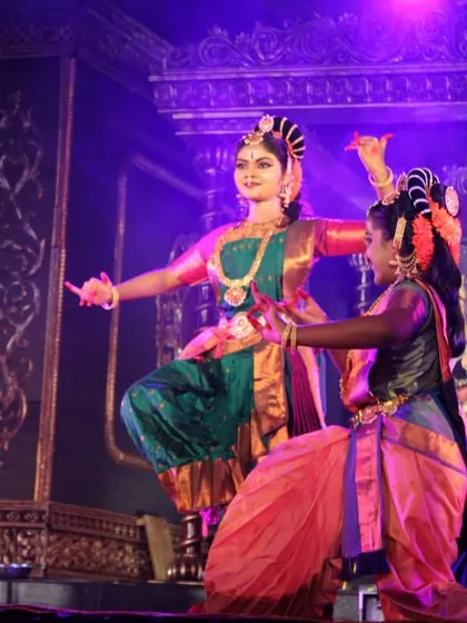 We offer 'Natya Seva' for sacred occasions, like this performance of 'Nava Durga' during a Navaratri festival. My students perform with devotion, their vibrant costumes and expressive storytelling creating a truly divine atmosphere for religious functions and temple events.