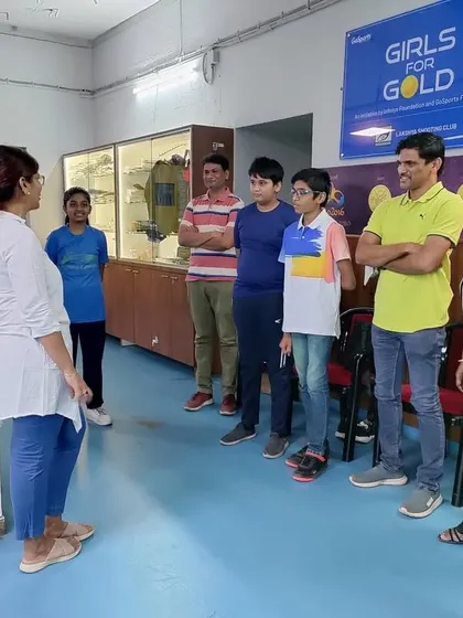 Suma Shirur giving tips to a group of campers and their parents. This direct interaction with an Olympian is a unique and motivating aspect of my program.
