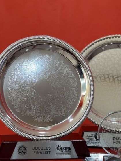 A close-up of the Doubles Finalist trophy from the SKME ITF Open. Every trophy represents countless hours of practice, dedication, and the champion mindset we instill in our players.