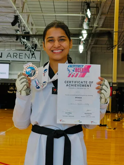 Sonia Bhardwaj with her certificate and Bronze medal from the 2024 WT President’s Cup in Oceania.