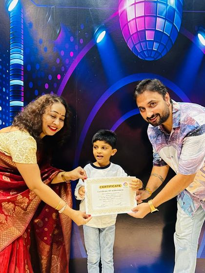 Young vocal star Aarav Taparia receives his achievement certificate. We are so proud of his effort, curiosity, and happy learning spirit.