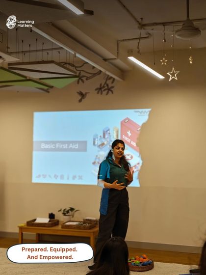 Prepared, equipped, and empowered. An educator presents during a Basic First Aid training session for our entire team, ensuring we are all ready to handle medical emergencies for both children and adults.