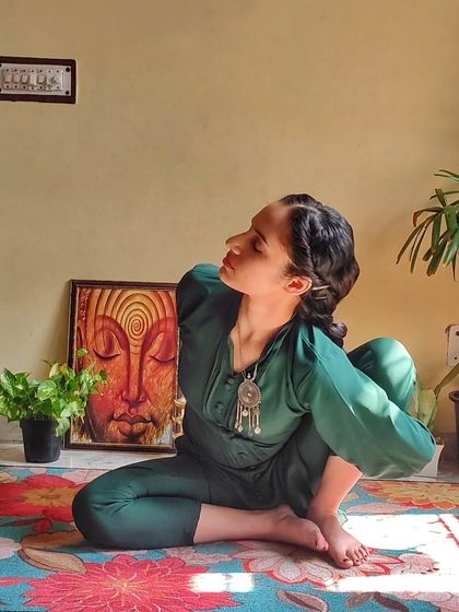 Ardha Matsyendrasana (Half Lord of the Fishes Pose). This spinal twist is excellent for improving the flexibility of the spine and releasing tension in the back and hips.