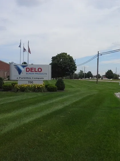 I handle commercial properties too. Here’s a lawn for a local company, looking sharp after a fresh mow. Keeping your business front looking professional is important.