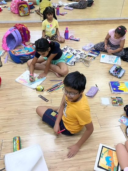 Young minds at work! I love seeing the focus and imagination that goes into each piece of art during our creative camp activities.
