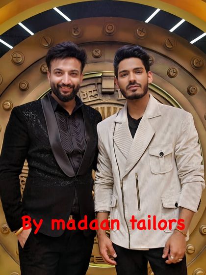 A behind the scenes shot from the set of 'Game of Greed', showing our custom black tuxedo with a shawl lapel and a modern corduroy jacket.