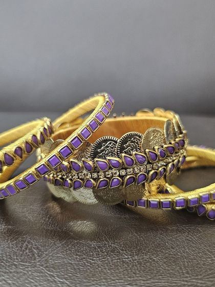 Detailed shots of the purple silk thread bangle set, highlighting the intricate kundan and coin work from every perspective.