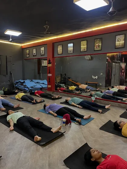 A guided Savasana (corpse pose) at the end of a session. This deep relaxation is key to integrating the benefits of the practice.
