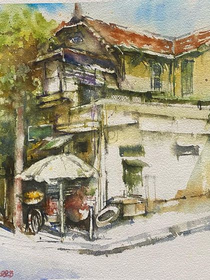 My love for old world charm is a recurring theme in my art. This watercolor of a vintage house with a small street-side stall is a perfect example of the subjects that are close to my heart.