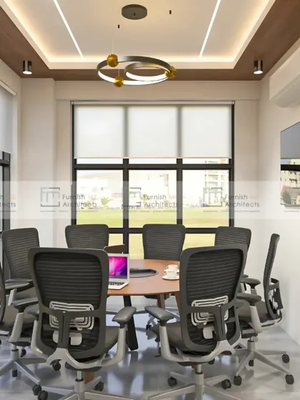 A bright and airy conference room with large windows and a clean, modern aesthetic. The circular pendant light adds a touch of contemporary elegance to the functional meeting space.