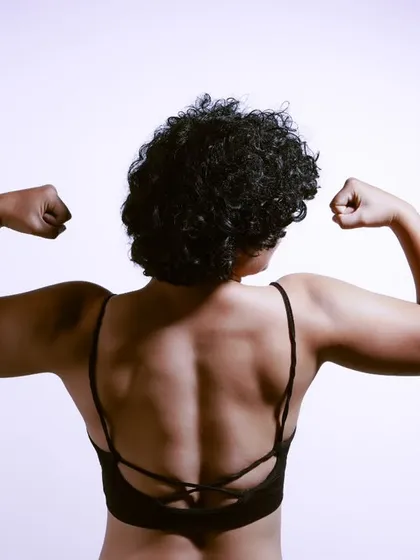 A fitness portrait showcasing the model's strength and physique. I use clean, simple lighting to define muscle tone, creating powerful images for personal trainers, fitness influencers, and athletes.