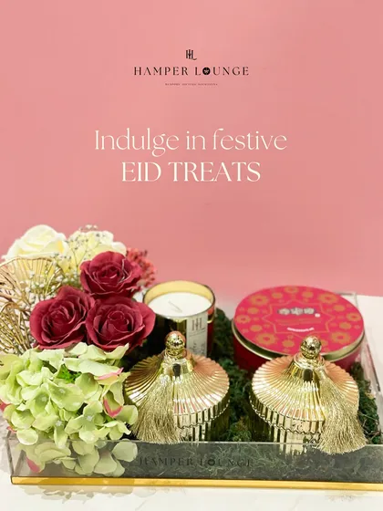 A different view of the acrylic tray Eid hamper, showing the rich colors and textures. The combination of red, gold, and green creates a truly festive and indulgent feel.
