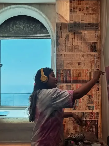 Here I am in my element, working on a custom portrait mural with a classic feel. My process always involves getting lost in the details to bring your vision to life, brushstroke by brushstroke.