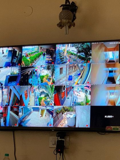 A 16-camera view on a large Sony TV, showing the powerful monitoring capabilities we can set up for you.