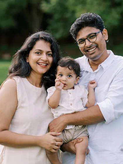 A happy family portrait taken after the rain cleared. We rolled with the weather and were rewarded with beautiful, soft sunlight.