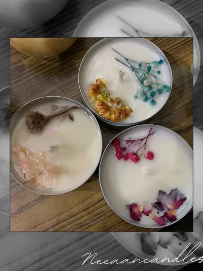 Delicate blooms, calming scents, and pure soy wax. These tin candles are handcrafted with love and topped with different dried botanicals to light up your moments.