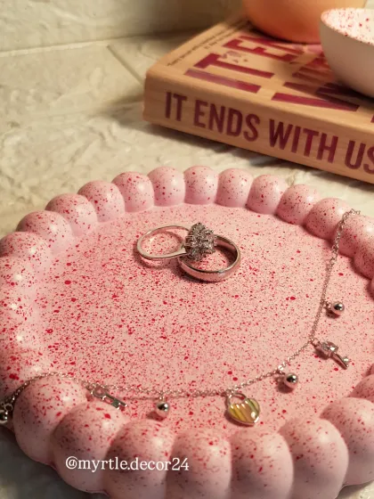 Our Pinterest-famous bubble tray in a lovely speckled pink. This piece adds a touch of playful elegance to any surface, perfect for holding your favorite rings and bracelets.