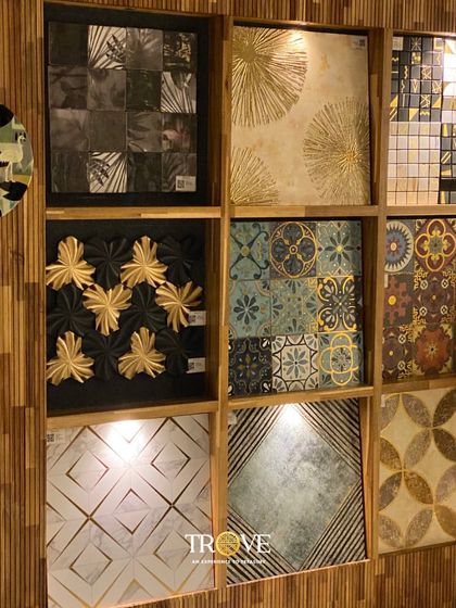 Our display walls are a source of inspiration, showcasing a curated mix of designer tiles. This collection features gold accented patterns, 3D floral designs, and classic Moroccan motifs.