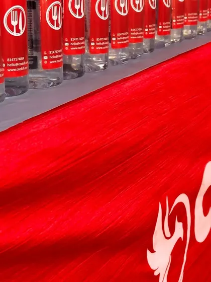 Our attention to detail extends to every aspect of the service, including providing custom branded water bottles. This small touch adds a layer of professionalism to your corporate event, as shown here at an annual day for The Oberoi.