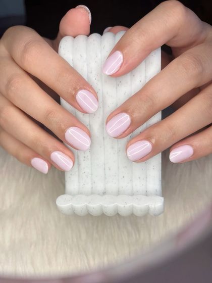 Another view of the chic milky lavender manicure.