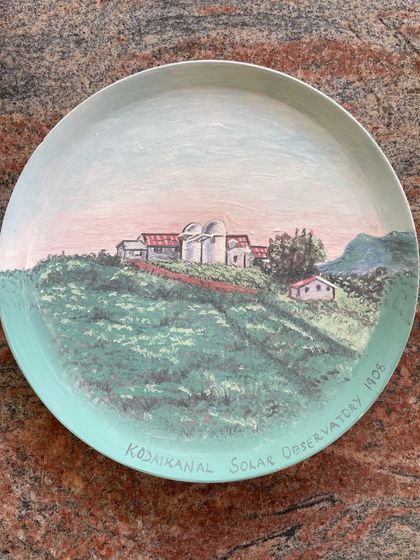 This hand-painted plate was a custom gift for a retiring scientist, depicting the Kodaikanal Solar Observatory. It’s projects like these, full of personal meaning, that I cherish the most.