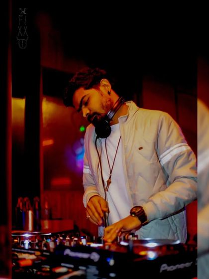 A candid shot from the console at The Fixx Bar. I'm always in my element when I'm mixing music and creating a vibe.